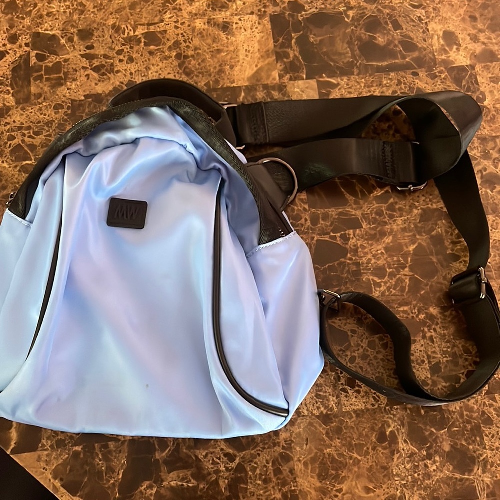 11x10 mini backpack can be used as a handbag or a backpack.